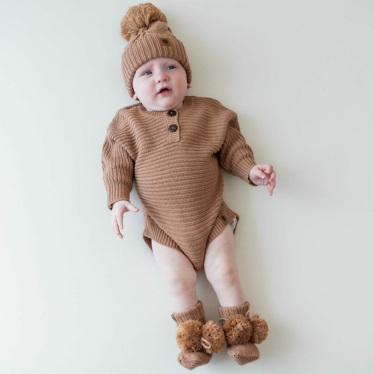 Chunky Cable Knit Beanie in Latte | Kyte Baby