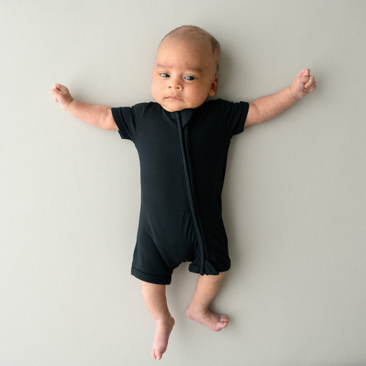 Zippered Shortall Romper in Midnight | Kyte Baby