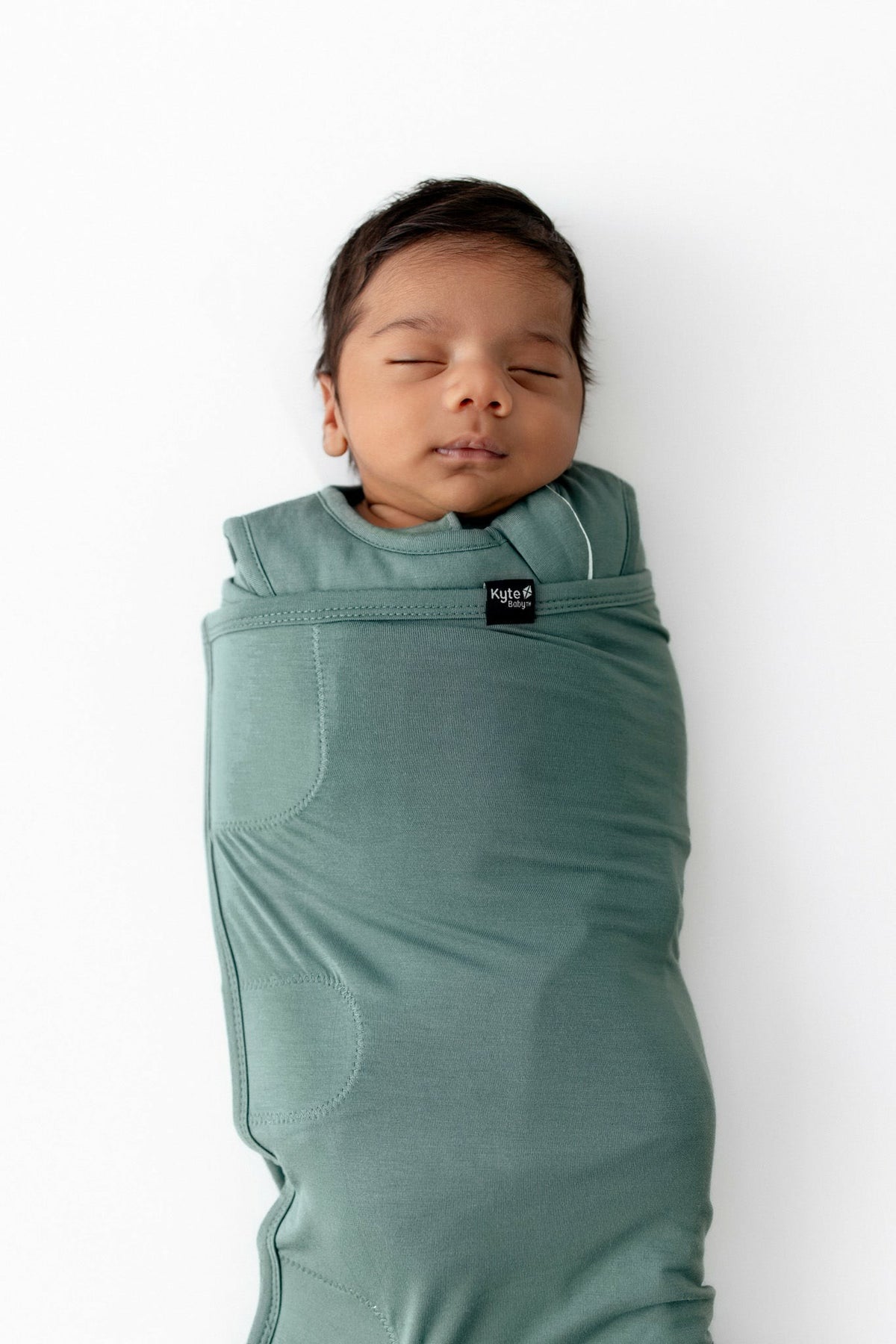 Sleep Bag Swaddler in Pine 1.0 | Kyte Baby