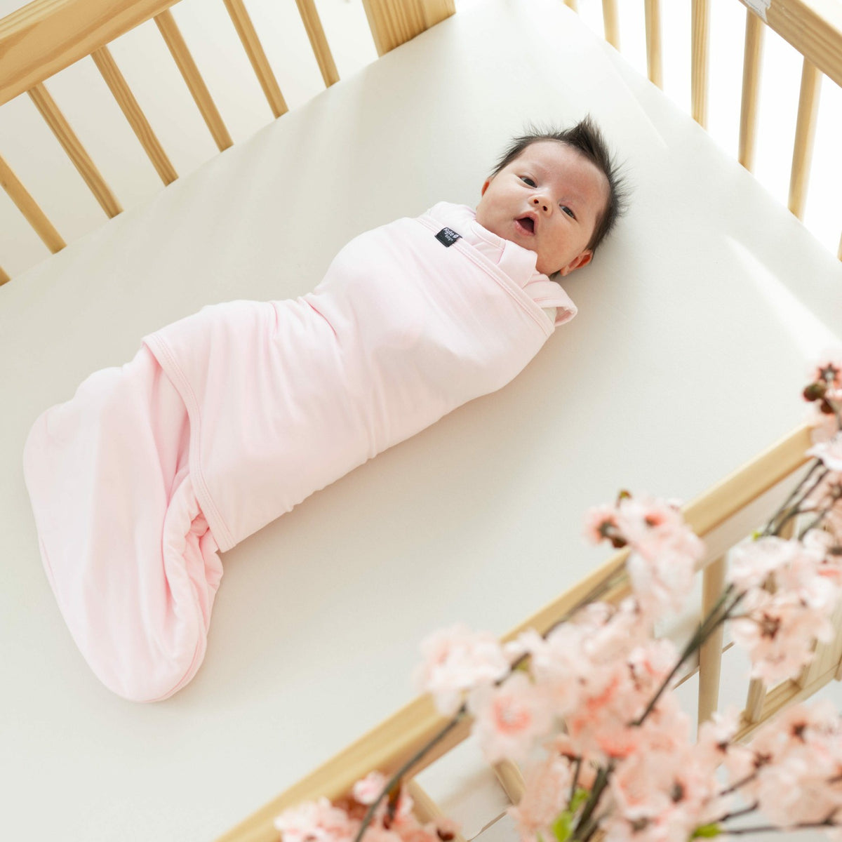 Sleep Bag Swaddler in Sakura | Kyte Baby