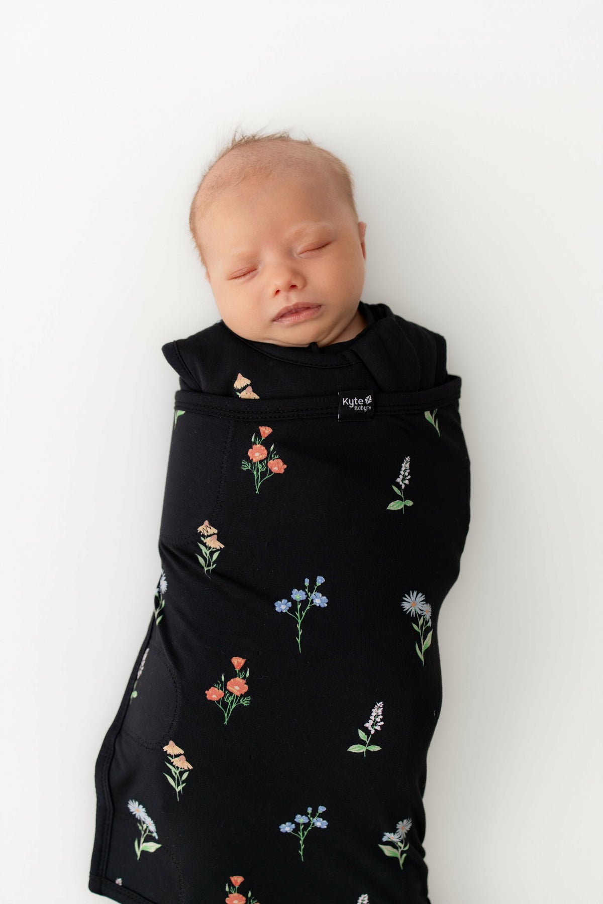 Sleep Bag Swaddler in Midnight Wildflower 1.0 | Kyte Baby