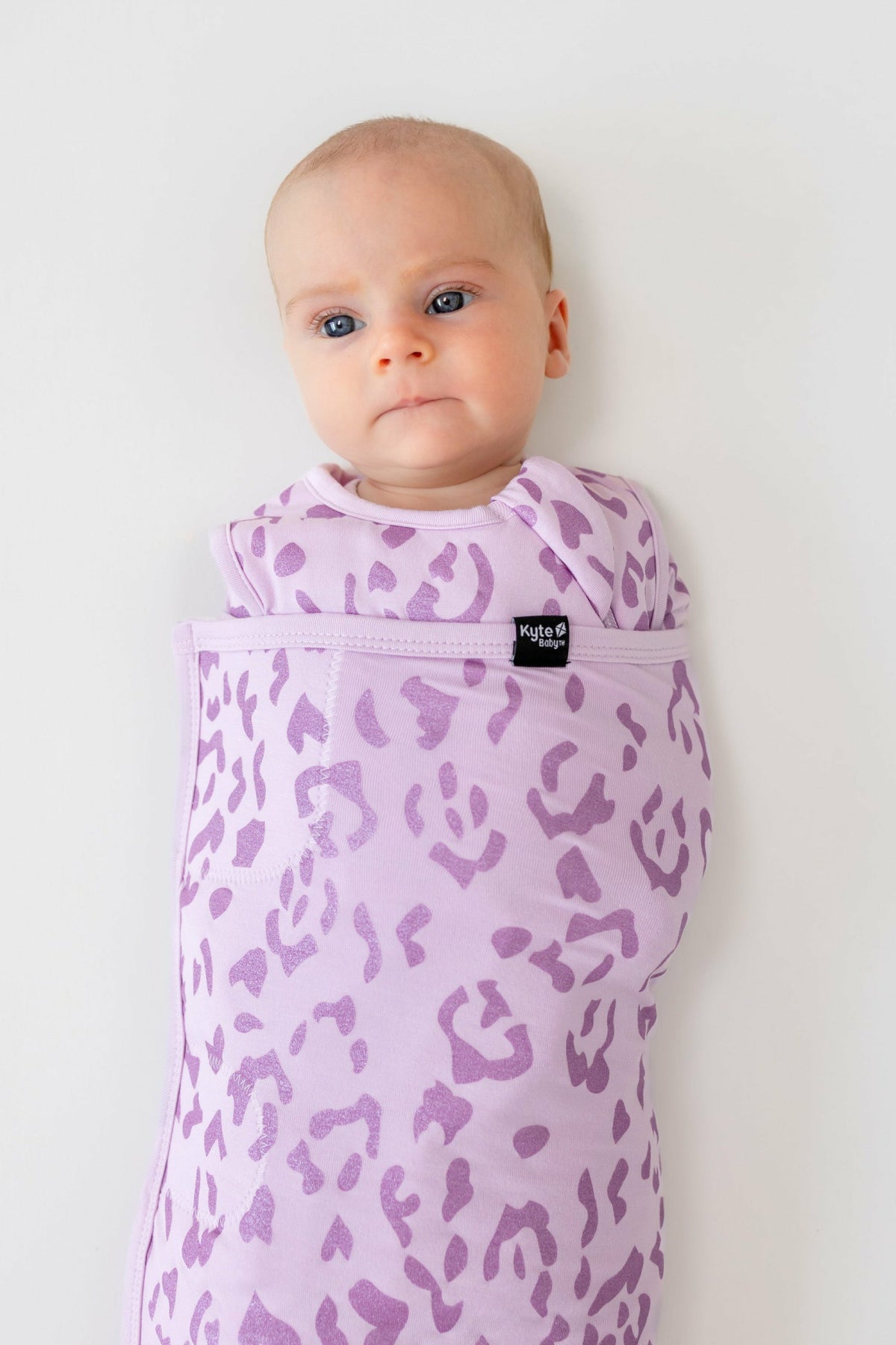 Sleep Bag Swaddler in Thistle Leopard 1.0 | Kyte Baby