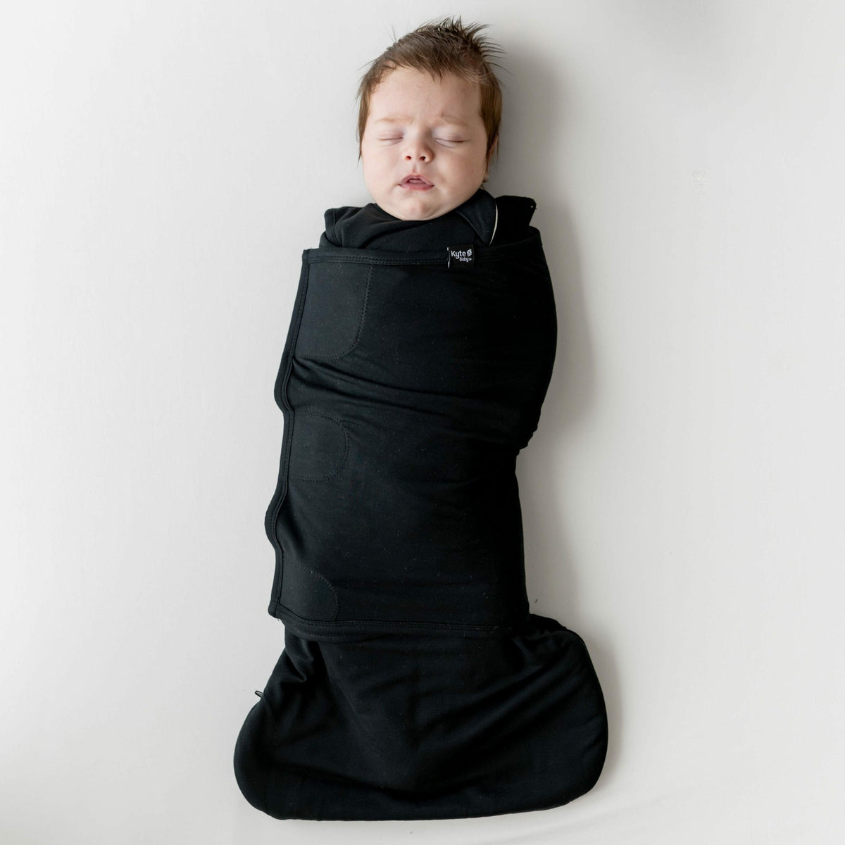 Sleep Bag Swaddler in Midnight | Kyte Baby