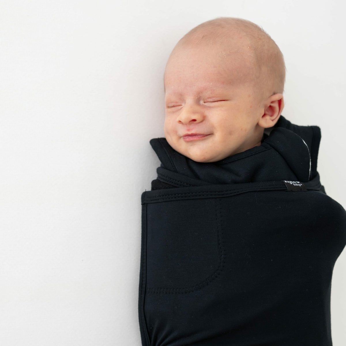 Sleep Bag Swaddler in Midnight | Kyte Baby