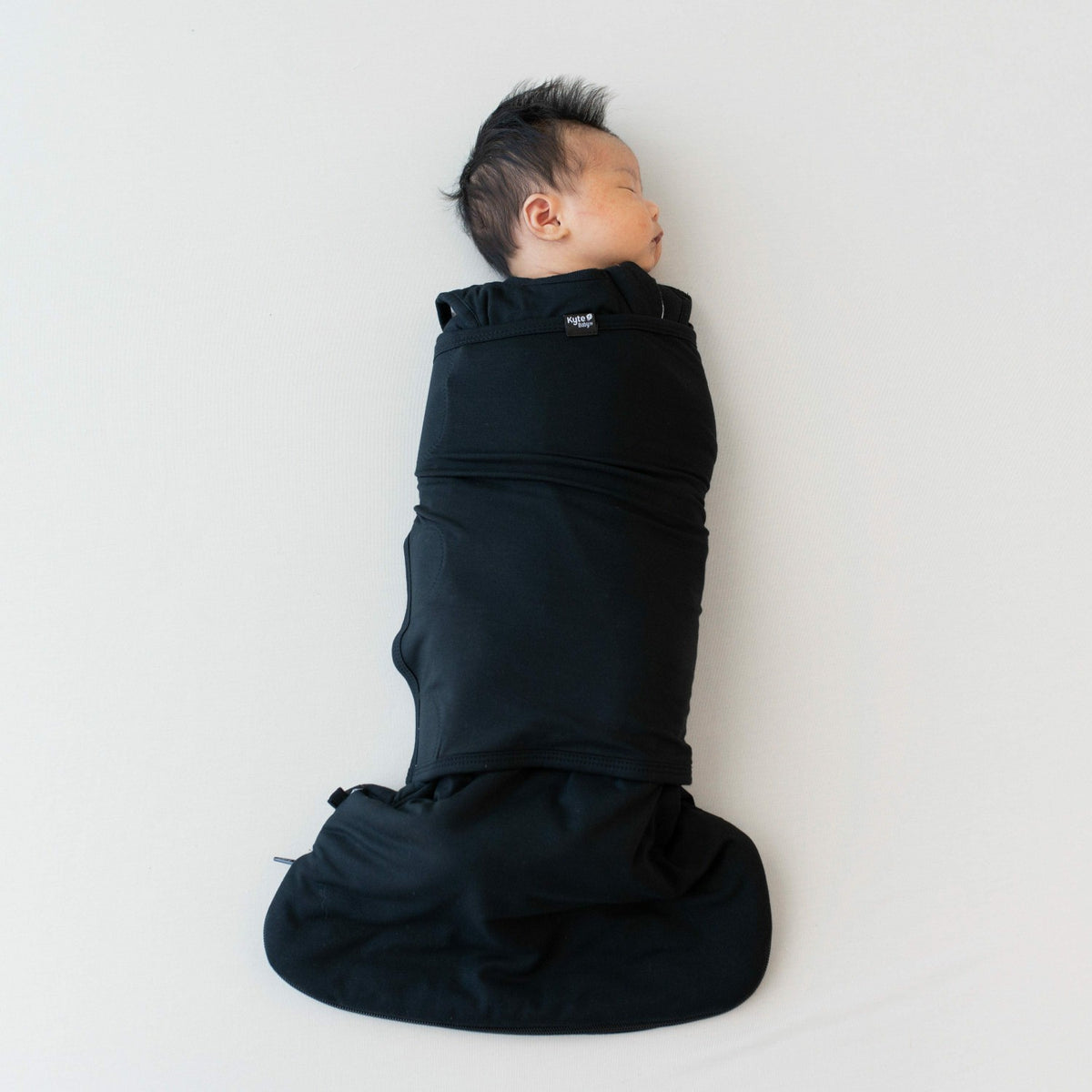 Sleep Bag Swaddler in Midnight | Kyte Baby