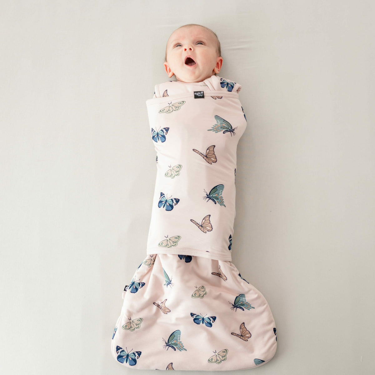 Sleep Bag Swaddler in Blush Butterfly 1.0 | Kyte Baby