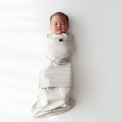 Sleep Bag Swaddler in Oat | Kyte Baby