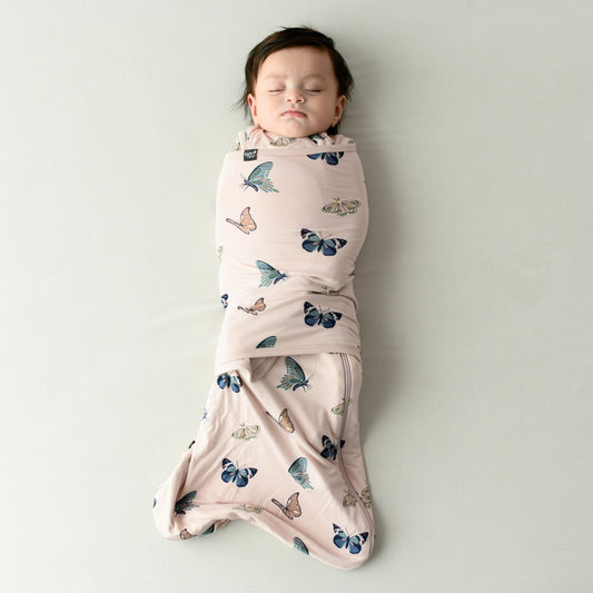 Sleep Bag Swaddler in Blush Butterfly 0.5 | Kyte Baby