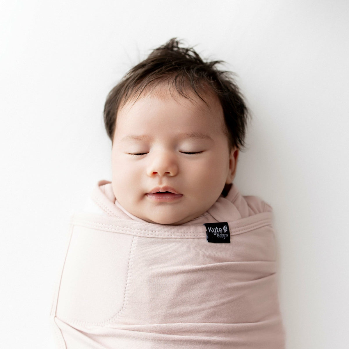 Sleep Bag Swaddler in Blush | Kyte Baby