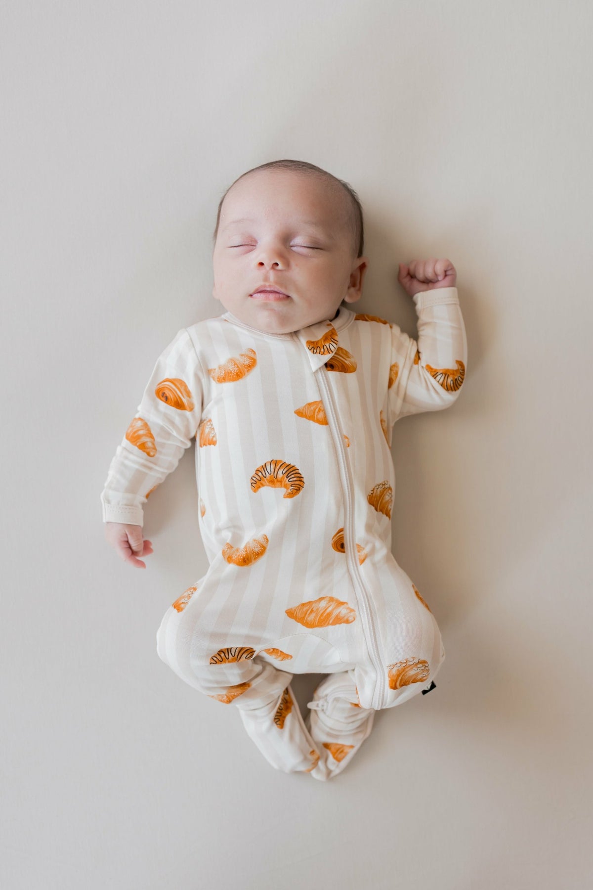 Zippered Footie in Croissant | Kyte Baby