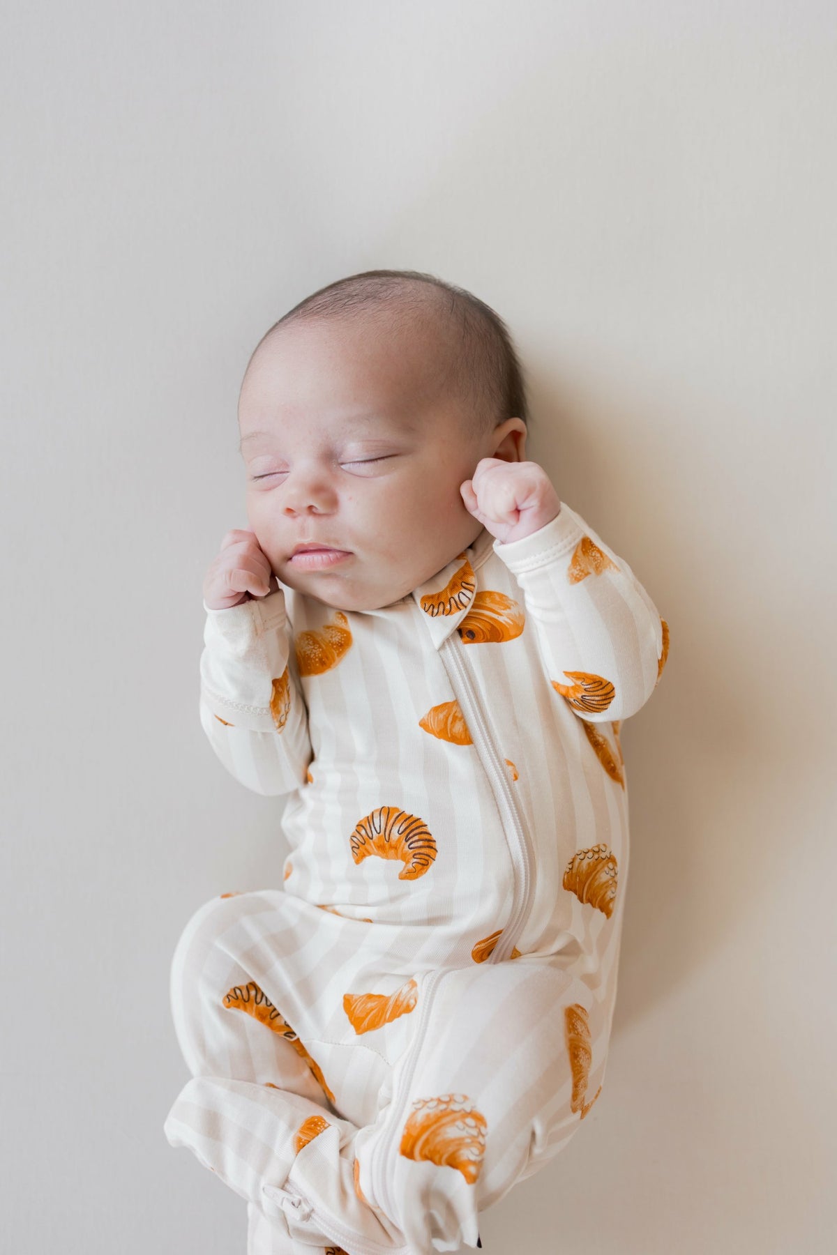 Zippered Footie in Croissant | Kyte Baby