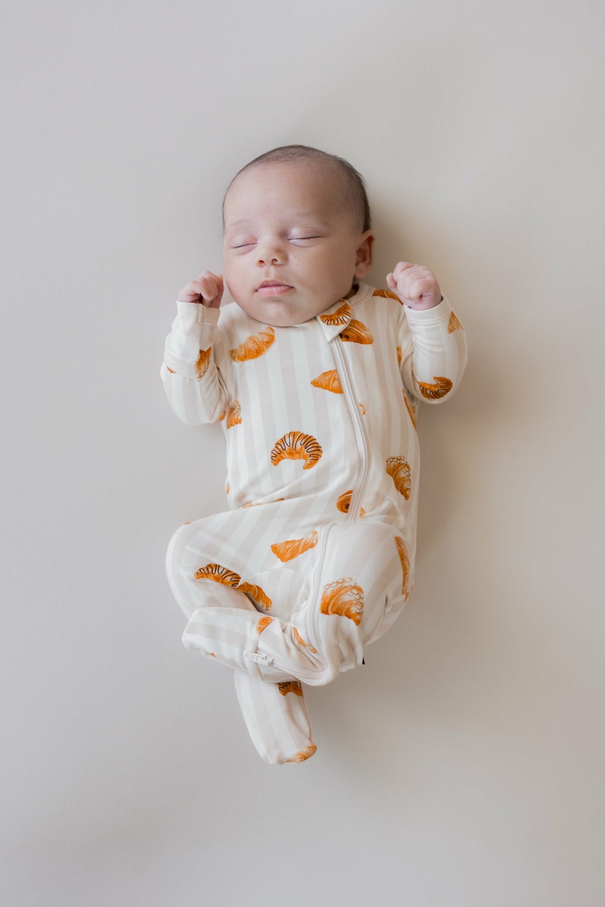 Zippered Footie in Croissant | Kyte Baby