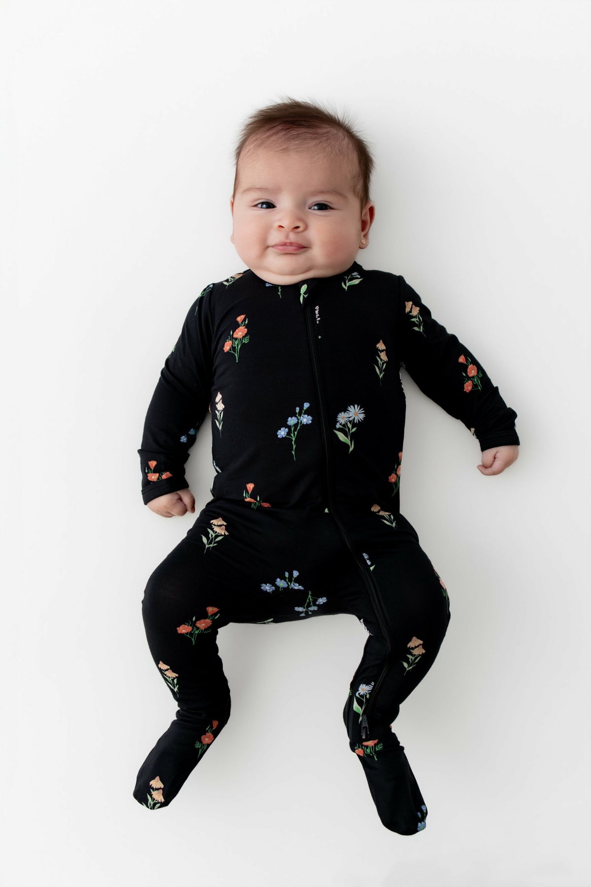 Zippered Footie in Midnight Wildflower | Kyte Baby