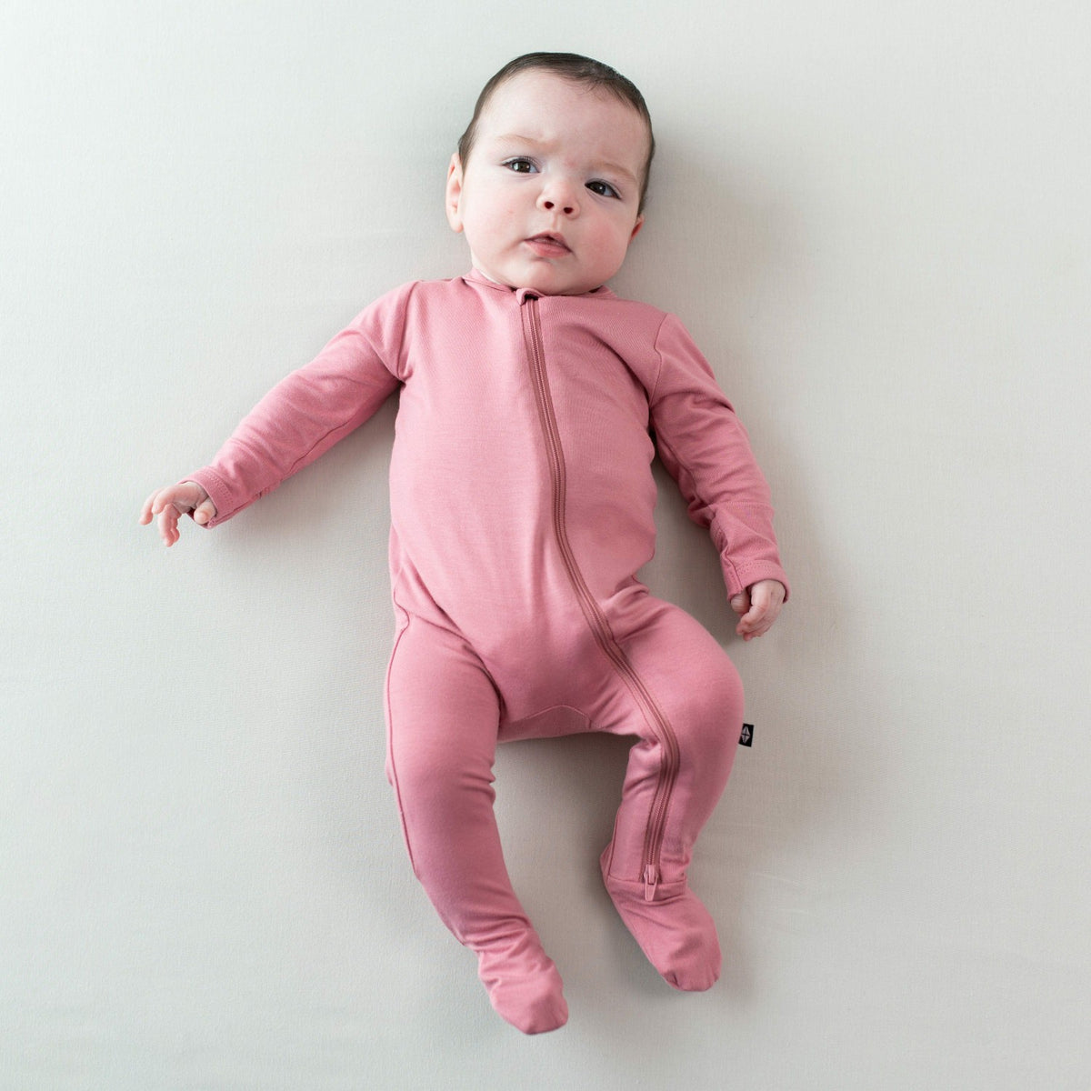 Zippered Footie in Apple Blossom | Kyte Baby
