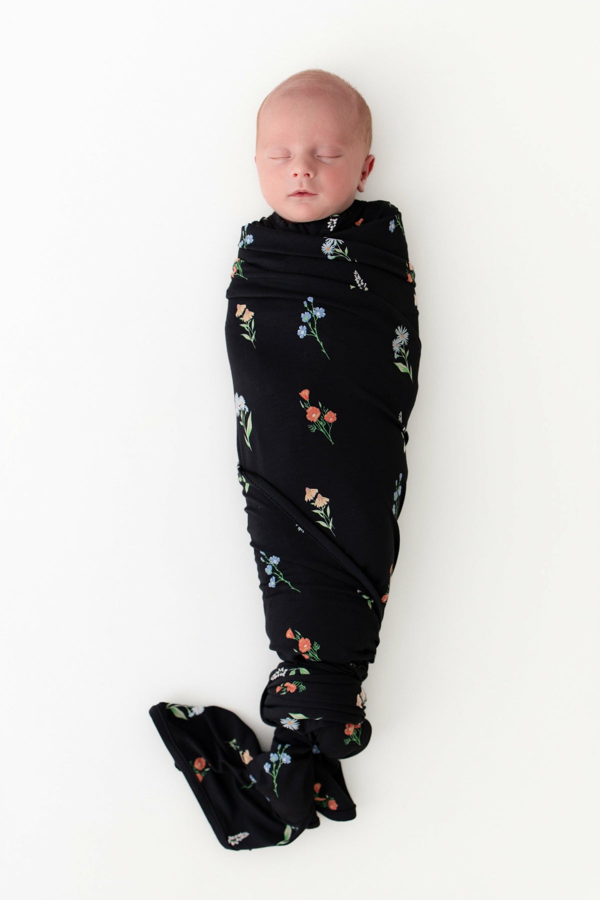 Swaddle Blanket in Midnight Wildflower | Kyte Baby