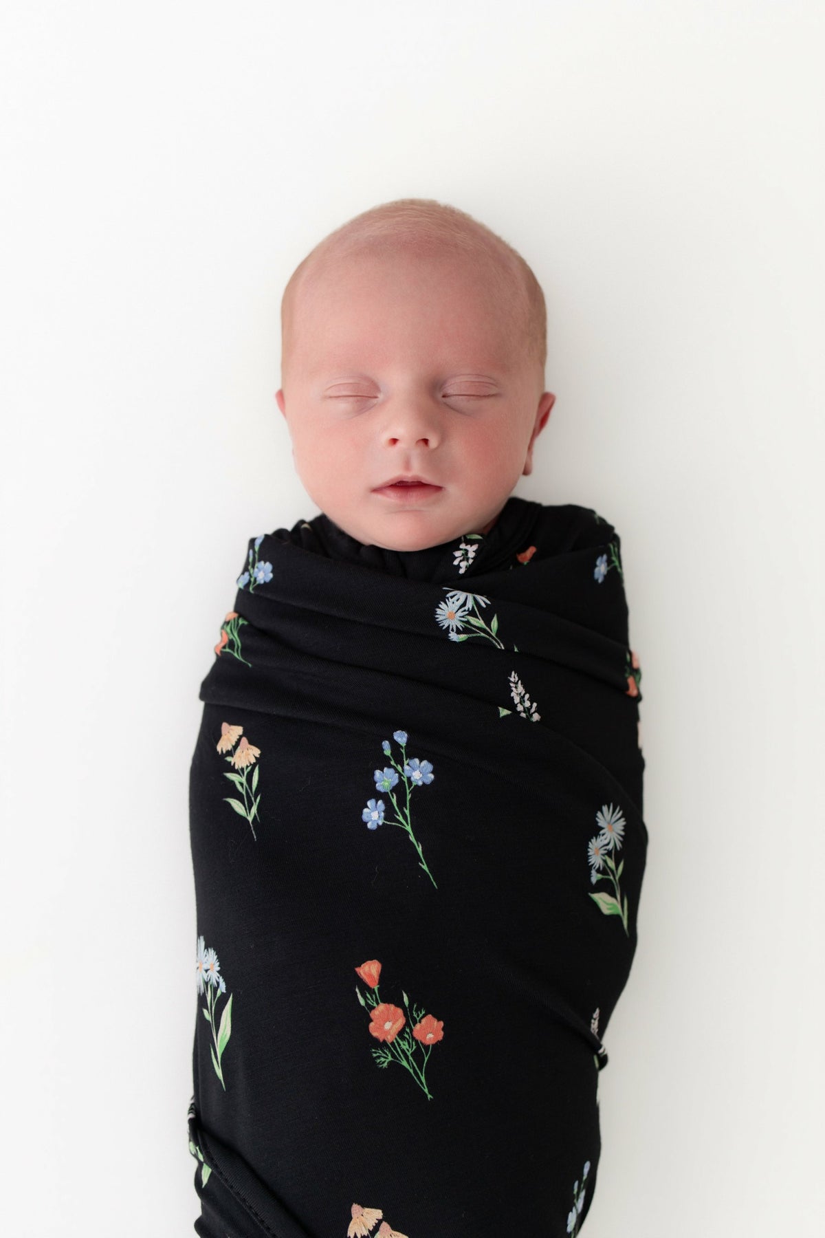 Swaddle Blanket in Midnight Wildflower | Kyte Baby