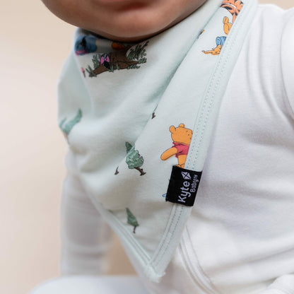 Bib in Winnie the Pooh Hundred Acre Wood | Kyte Baby