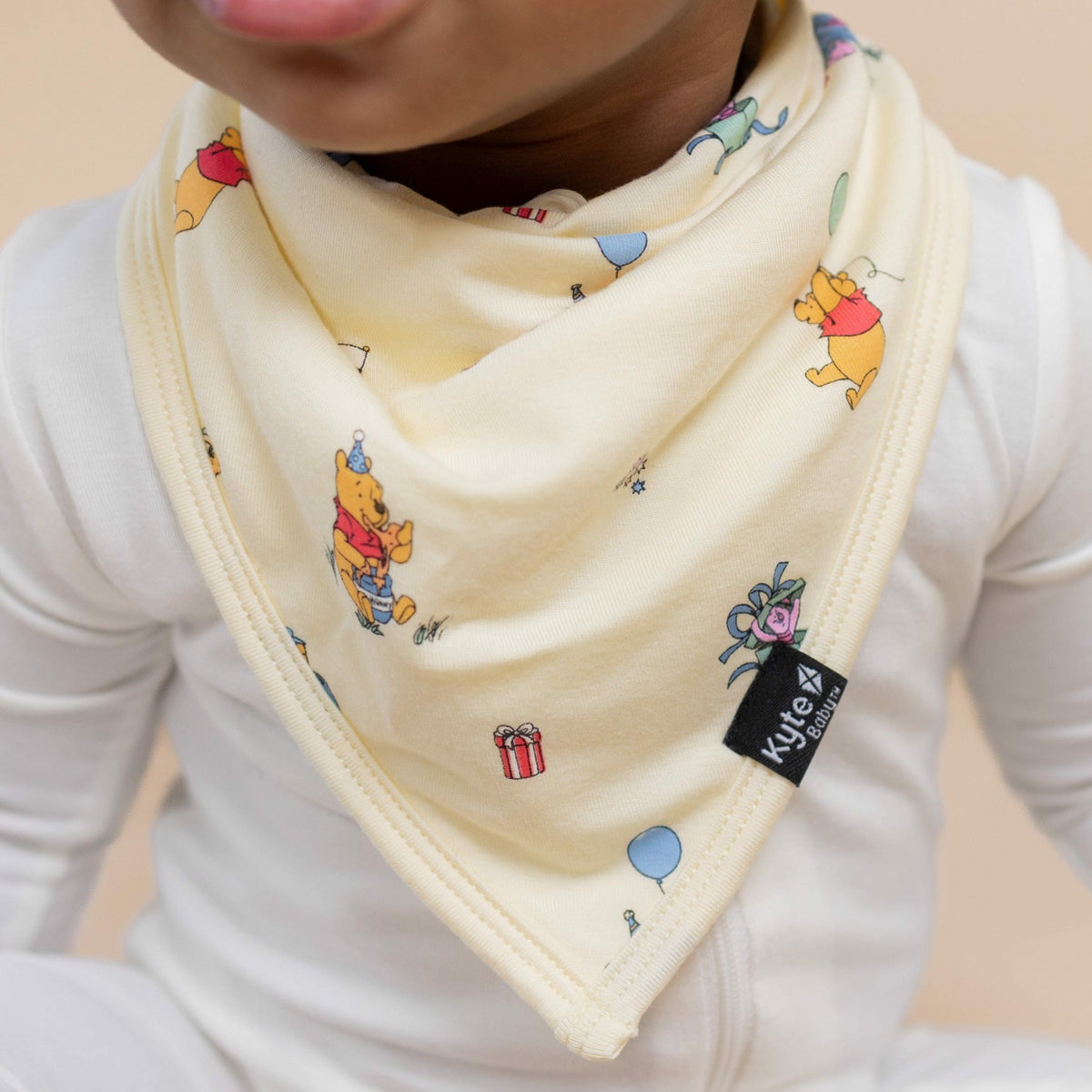 Bib in Winnie the Pooh Celebration | Kyte Baby