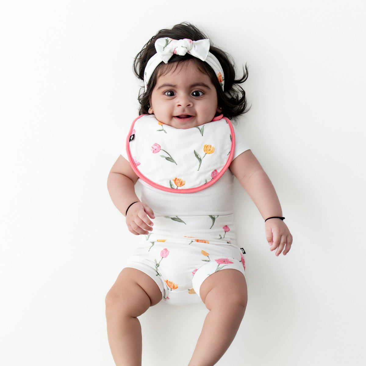 Cushy Bib in Tulip | Kyte Baby