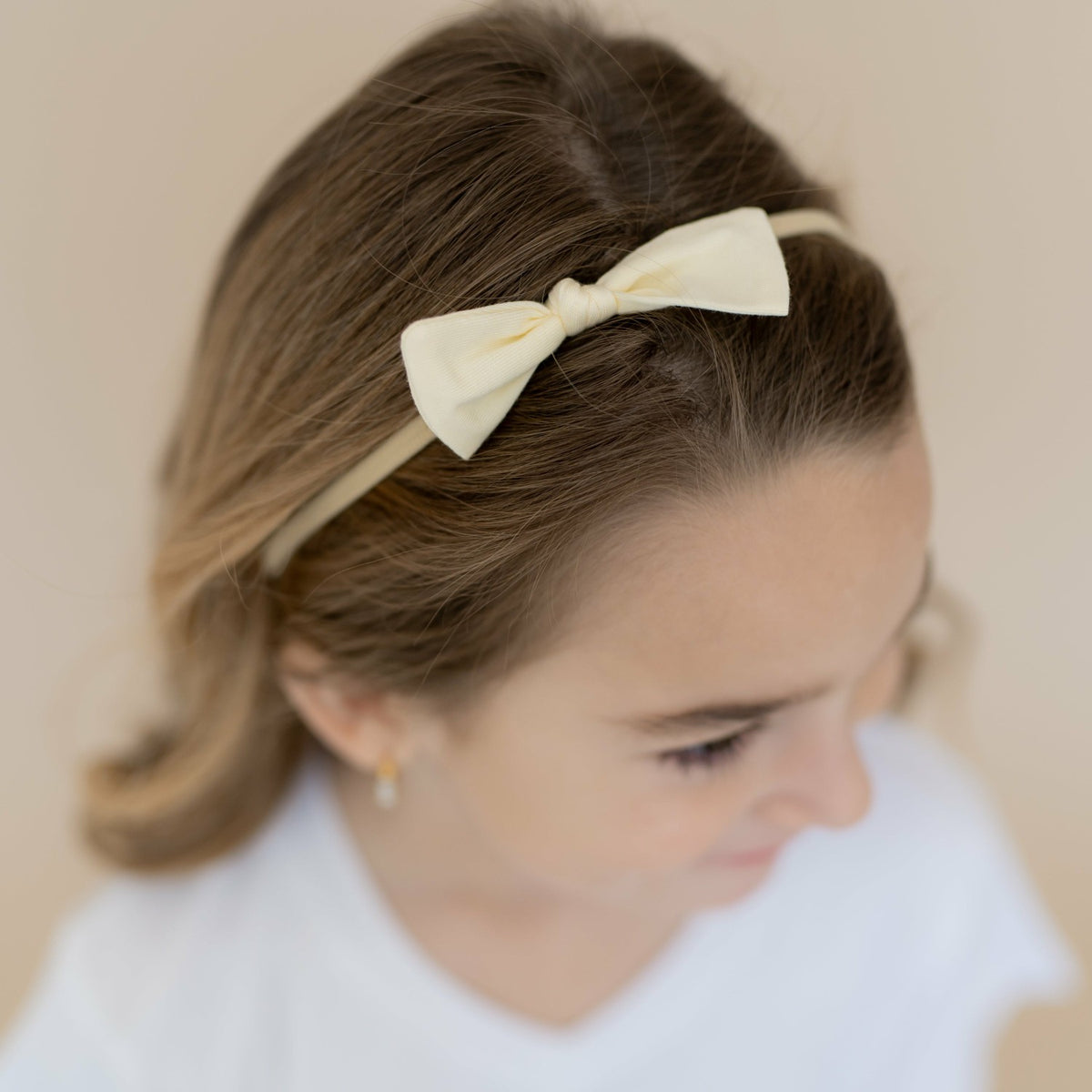 Tiny Nylon Bow in Chamomile | Kyte Baby