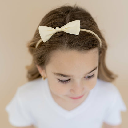 Tiny Nylon Bow in Chamomile | Kyte Baby