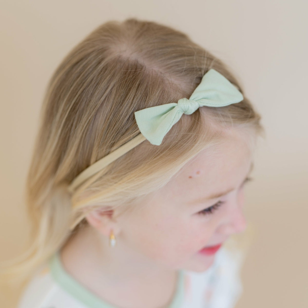 Tiny Nylon Bow in Basil | Kyte Baby