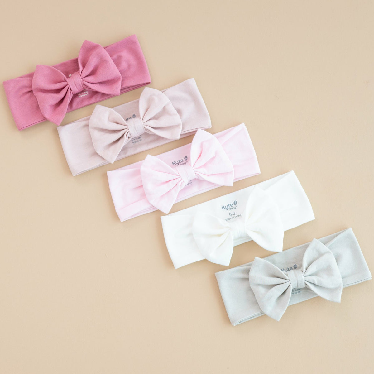 Bow Headband in Blush | Kyte Baby