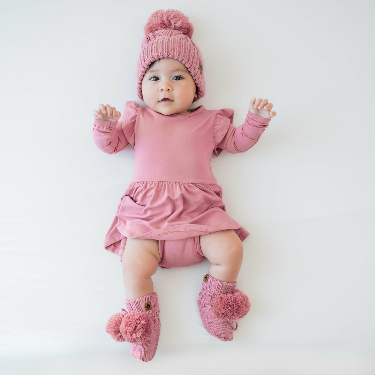 Knit Booties in Apple Blossom | Kyte Baby