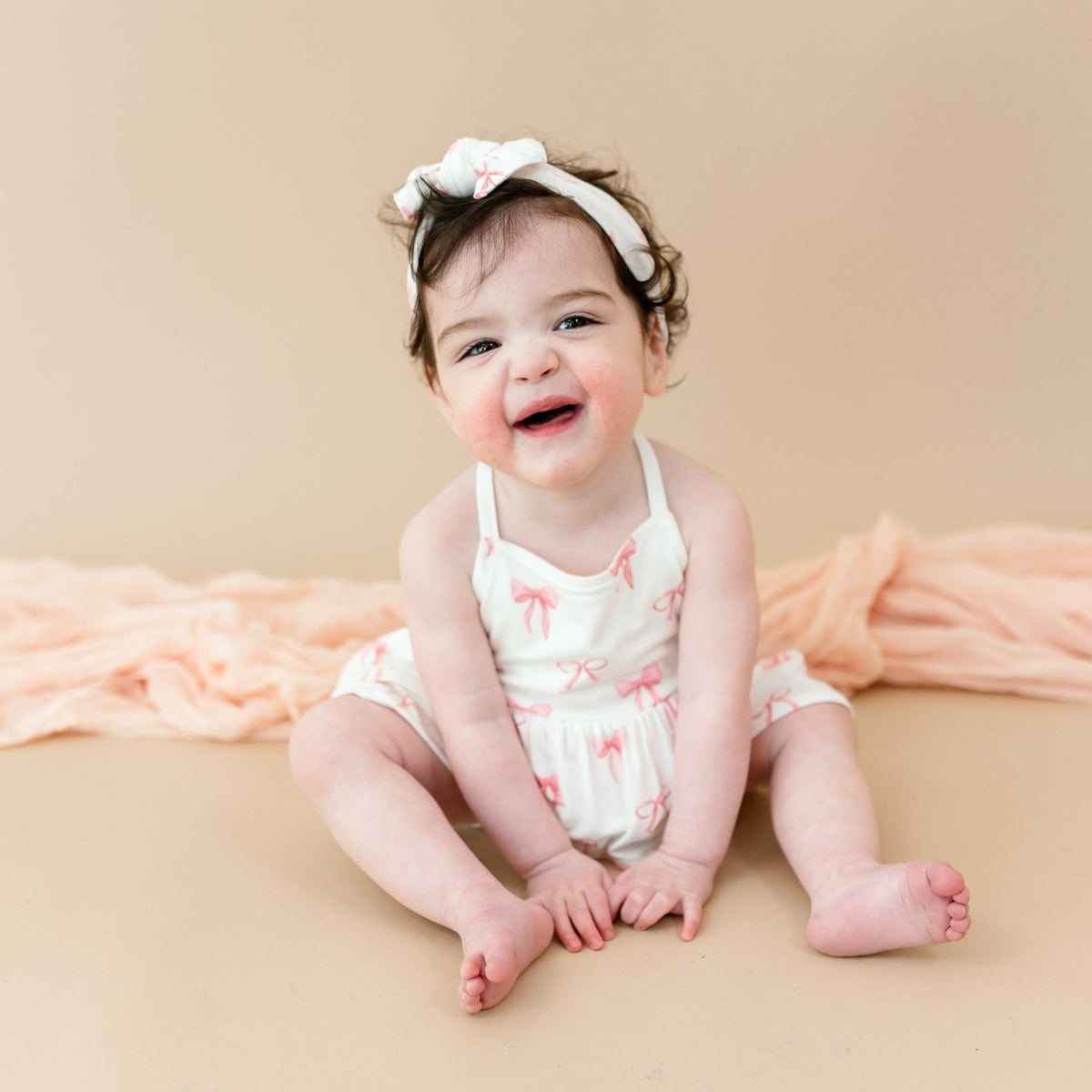 Spaghetti Strap Ruffle Romper in Bow | Kyte Baby
