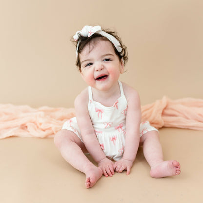 Spaghetti Strap Ruffle Romper in Bow | Kyte Baby