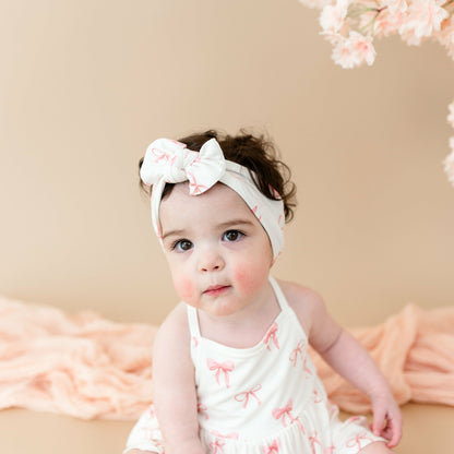 Spaghetti Strap Ruffle Romper in Bow | Kyte Baby