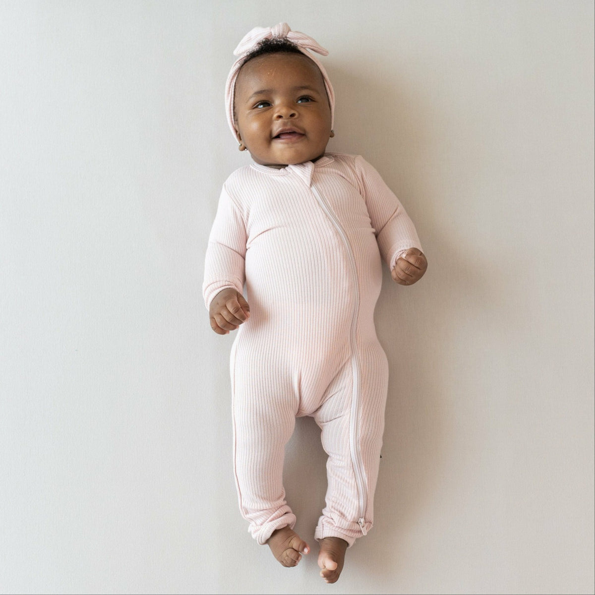 Ribbed Zipper Romper in Blush | Kyte Baby