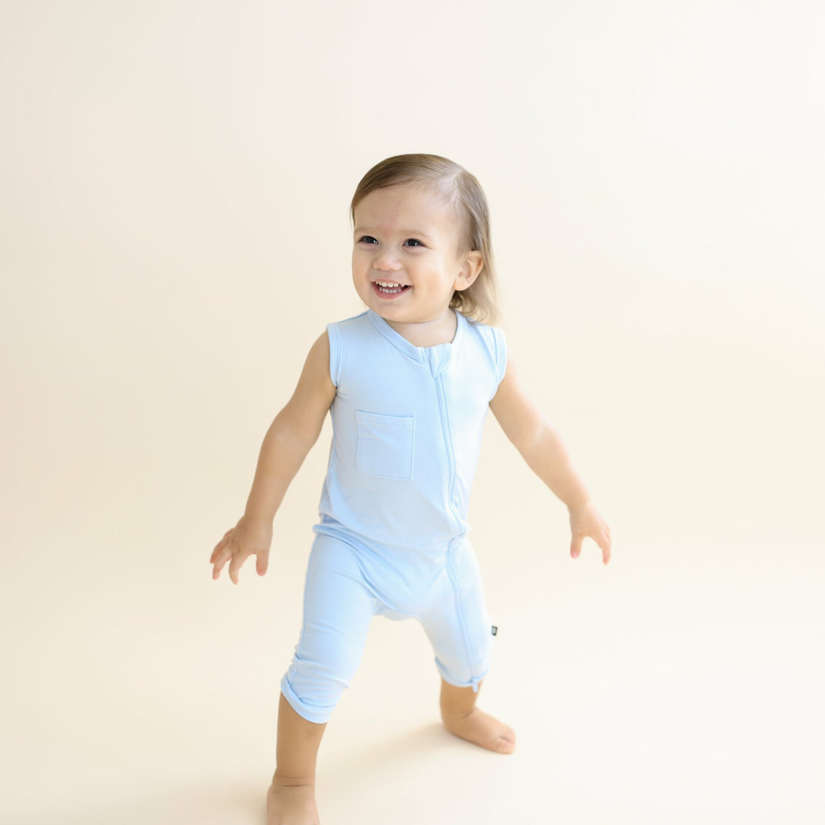 Zippered Sleeveless Romper in Breeze | Kyte Baby