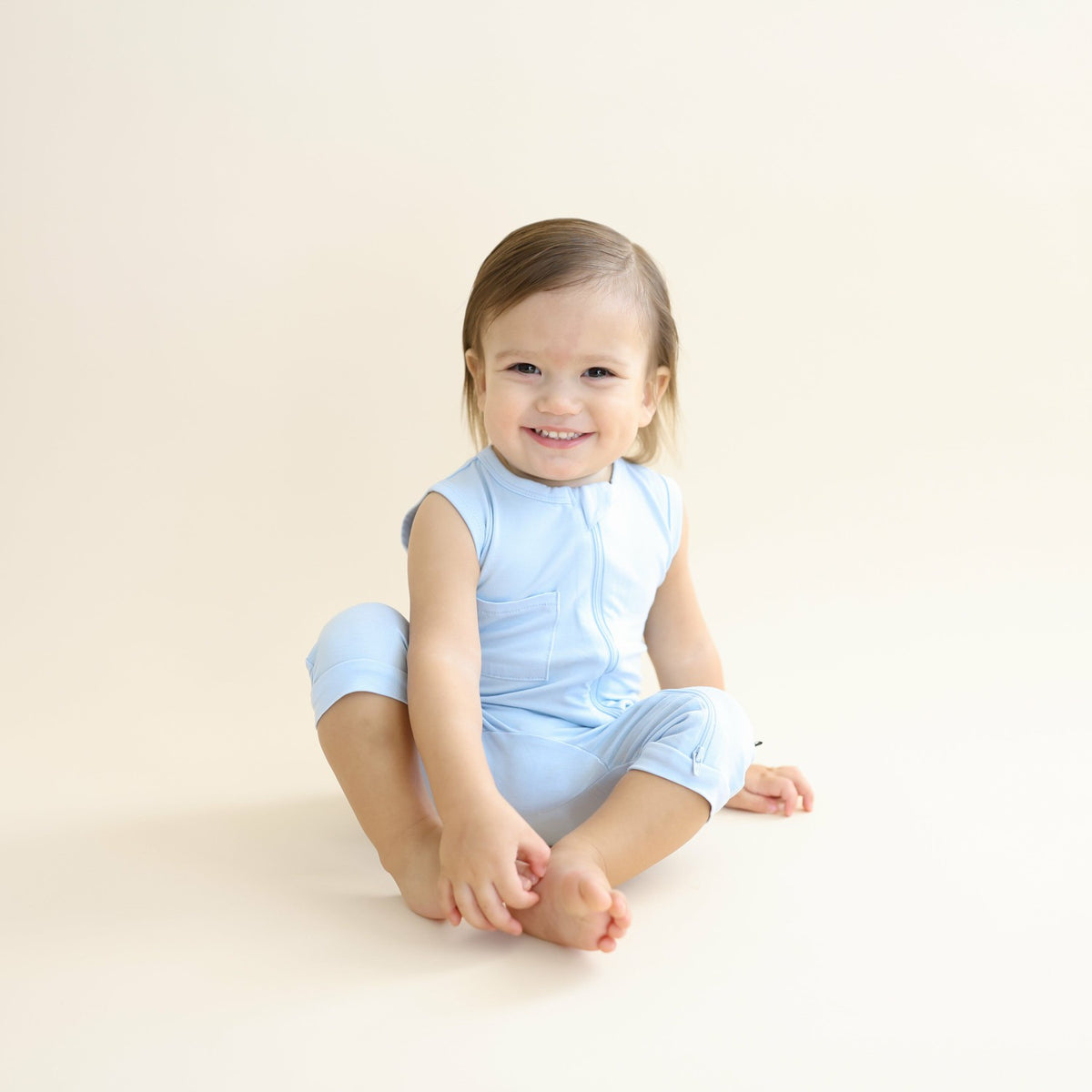 Zippered Sleeveless Romper in Breeze | Kyte Baby