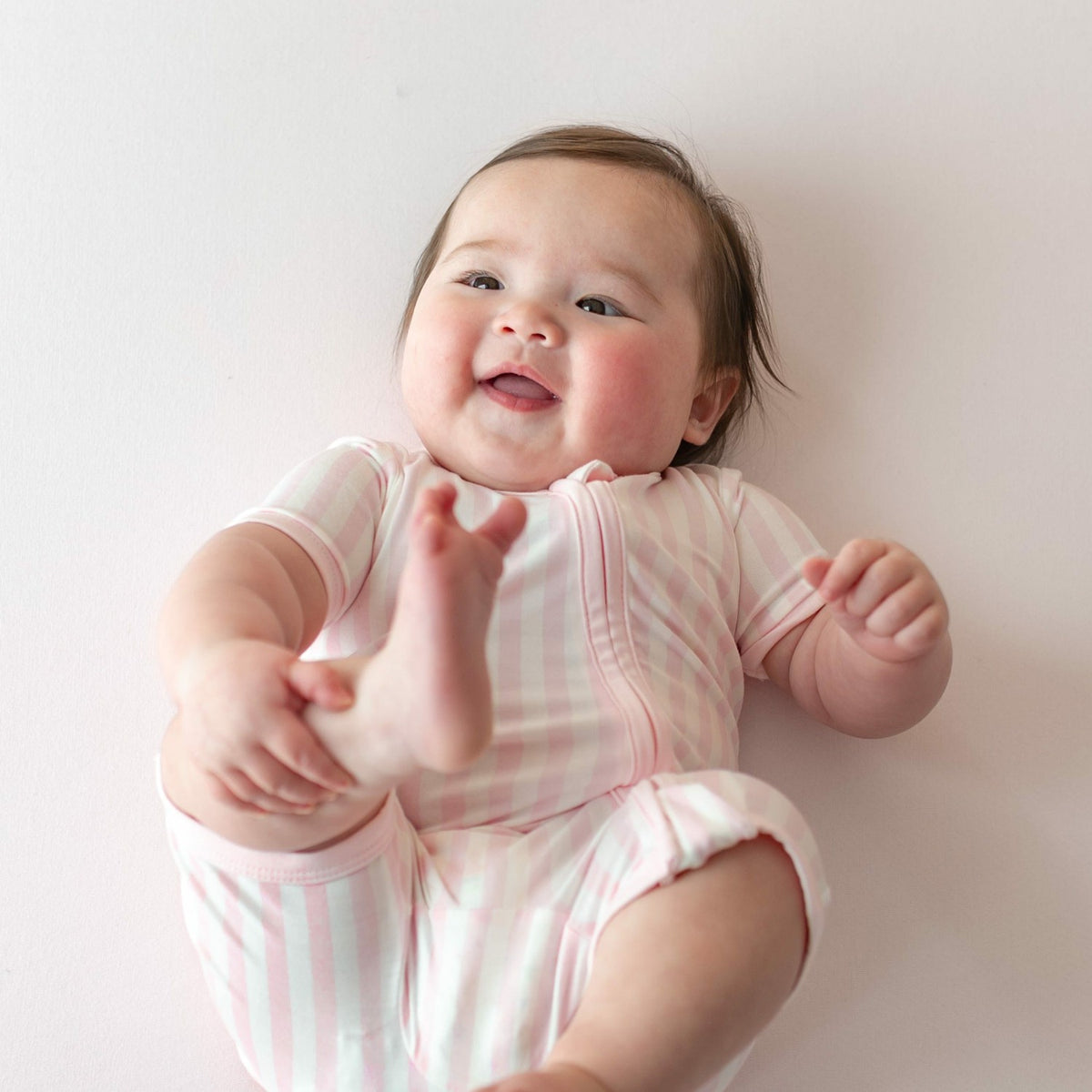 Zipper Shortall Romper in Small Sakura Stripe | Kyte Baby