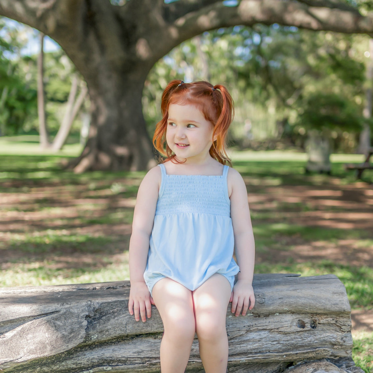 Smocked Bubble Romper in Breeze | Kyte Baby