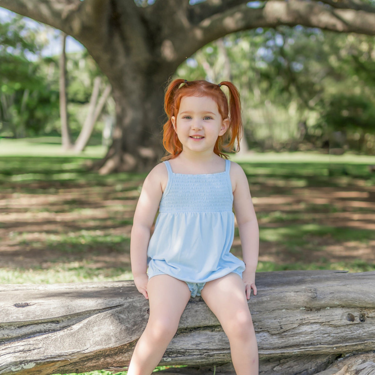 Smocked Bubble Romper in Breeze | Kyte Baby