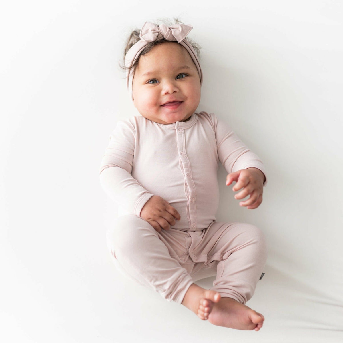 Snap Romper in Blush | Kyte Baby