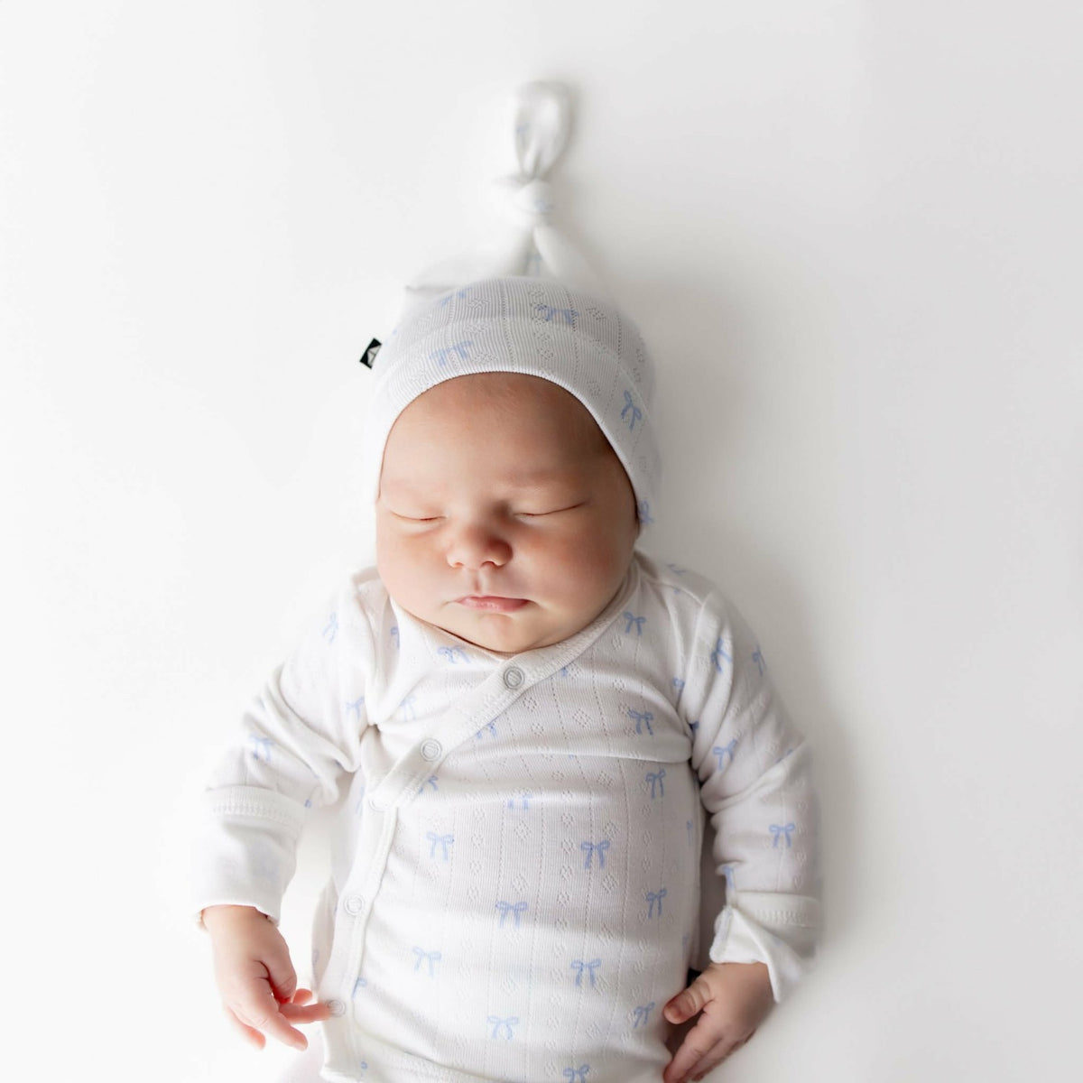 Pointelle Take Me Home Set with Cap in Sweet Blue Bow | Kyte Baby
