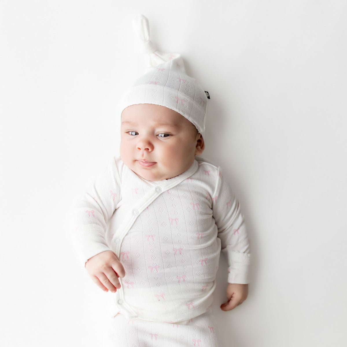 Pointelle Take Me Home Set with Cap in Sweet Pink Bow | Kyte Baby