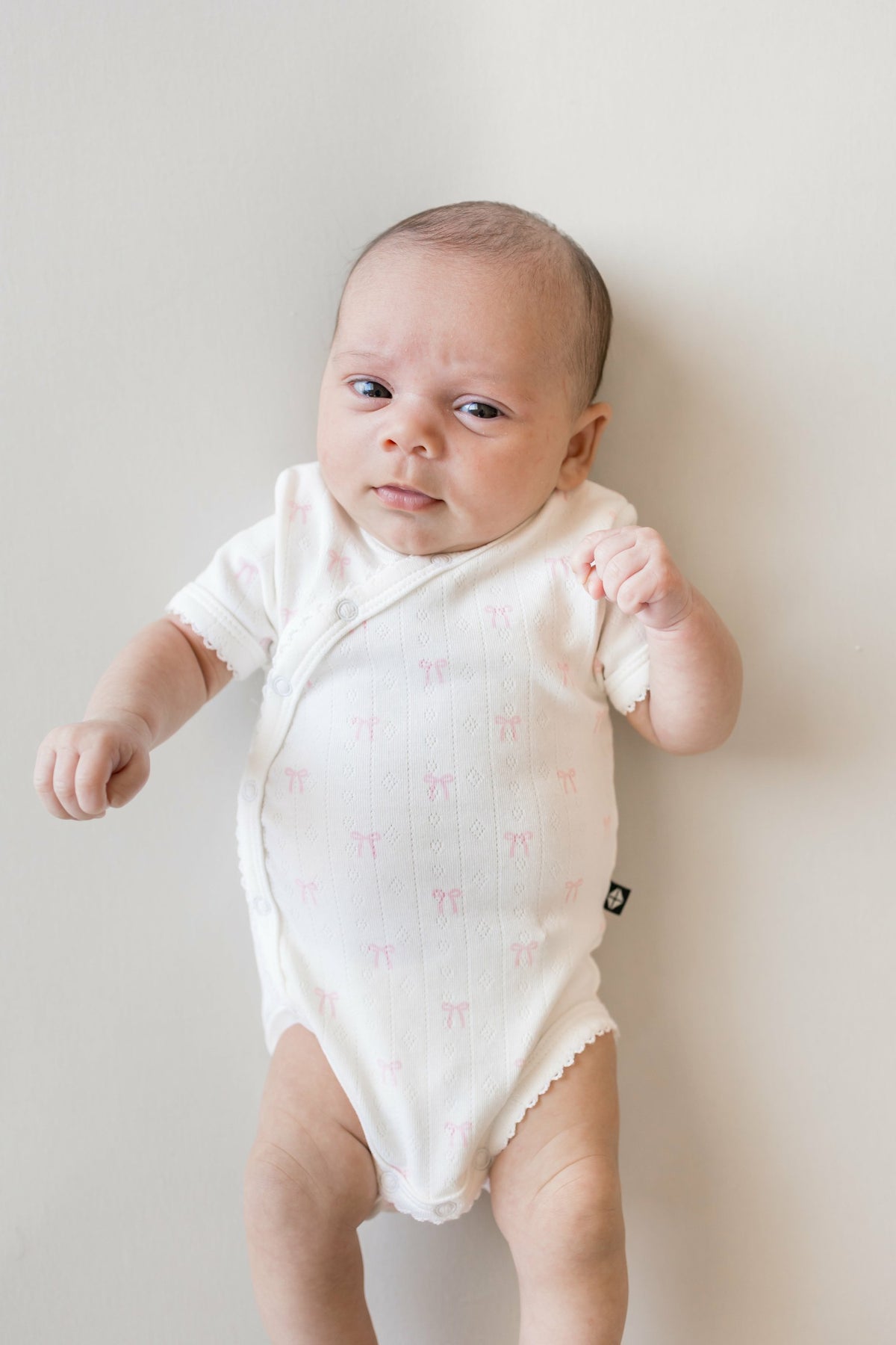 Pointelle Kimono Bodysuit in Sweet Pink Bow | Kyte Baby