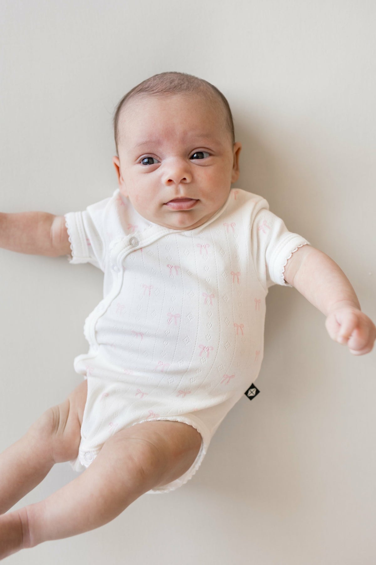 Pointelle Kimono Bodysuit in Sweet Pink Bow | Kyte Baby