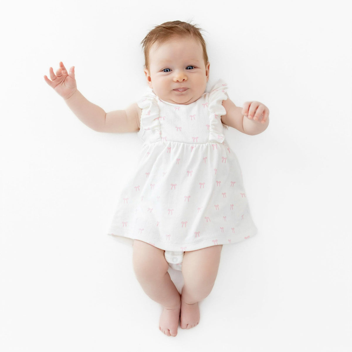 Pointelle Bodysuit Dress in Sweet Pink Bow | Kyte Baby
