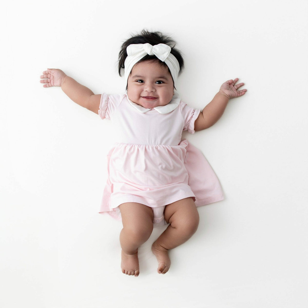 Peter Pan Collar Bodysuit Dress in Sakura | Kyte Baby
