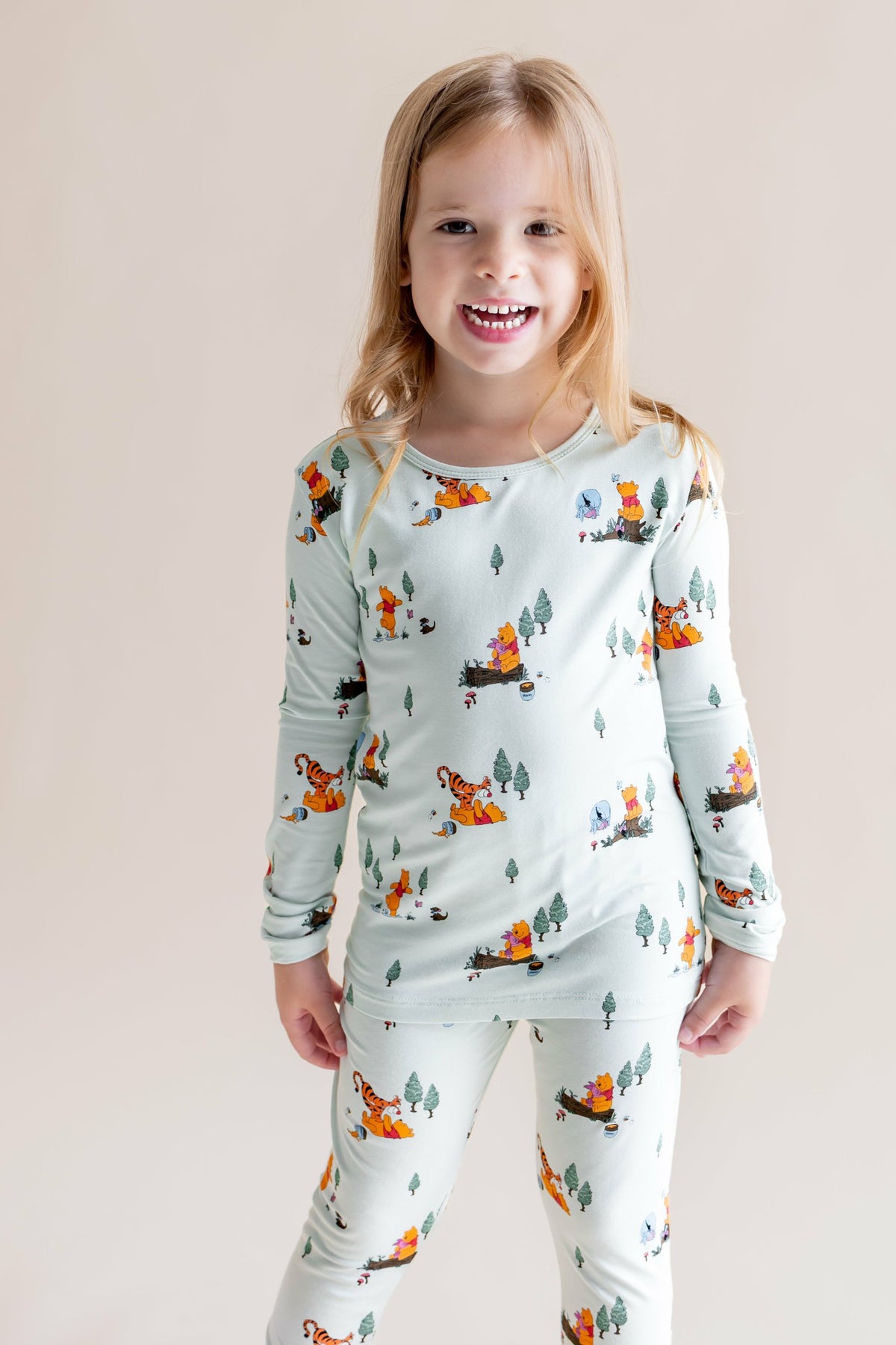 Long Sleeve Pajamas in Winnie the Pooh Hundred Acre Wood | Kyte Baby