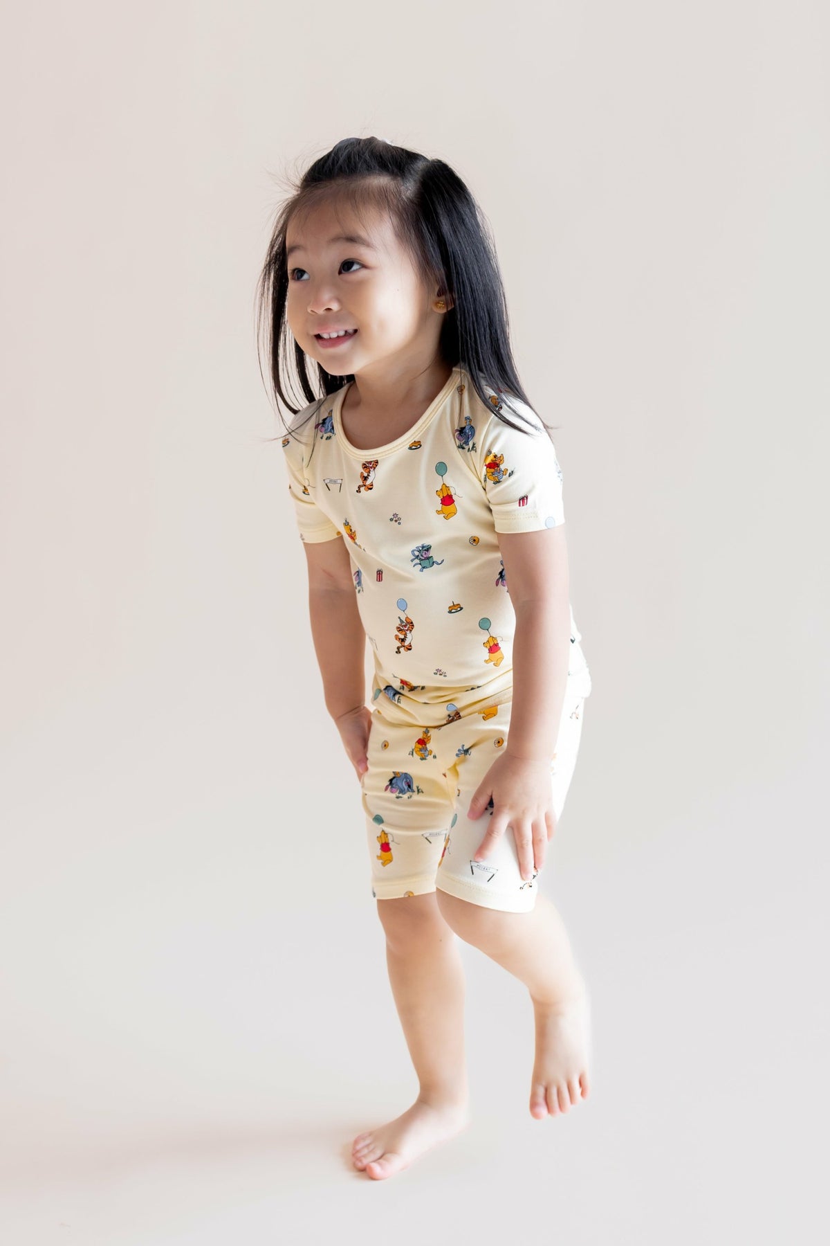 Short Sleeve Pajamas in Winnie the Pooh Celebration | Kyte Baby