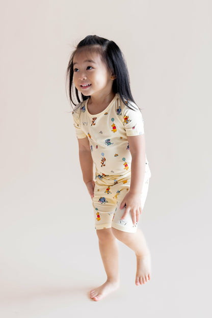 Short Sleeve Pajamas in Winnie the Pooh Celebration | Kyte Baby