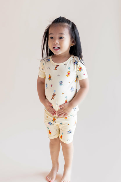 Short Sleeve Pajamas in Winnie the Pooh Celebration | Kyte Baby