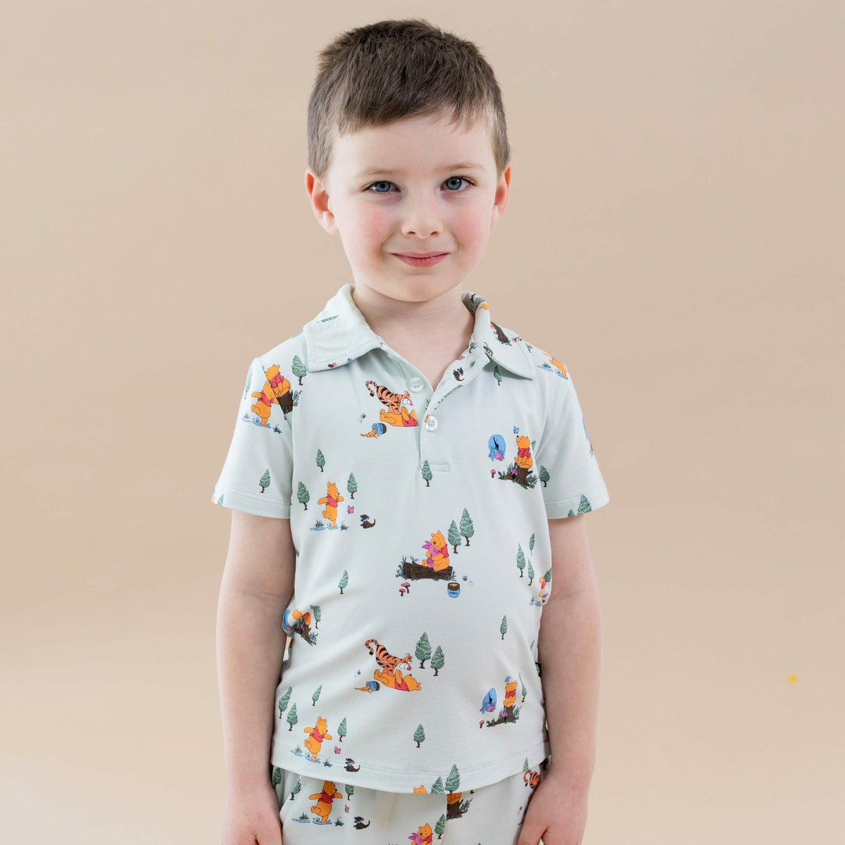Toddler Short Sleeve Polo in Winnie the Pooh Hundred Acre Wood | Kyte Baby