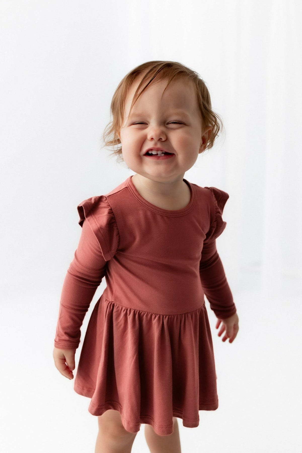 Long Sleeve Twirl Bodysuit Dress in Ember | Kyte Baby